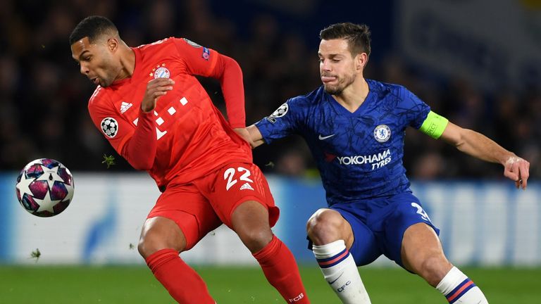 Chelsea defender Cesar Azpilicueta and Bayern Munich's Serge Gnabry battle for possession 