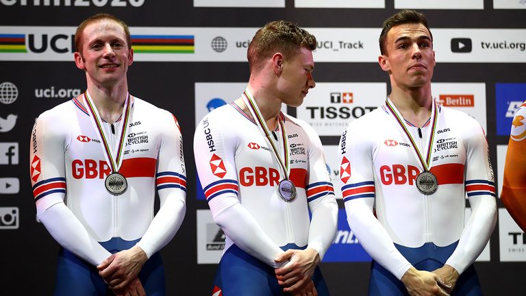Great Britain's Jason Kenny (left) Jack Carlin (centre) and Ryan Owens collect their silver meal after coming second in the final of the Men's Team Sprint during day one of the 2020 UCI Track Cycling World Championships at Velodrom, Berlin.