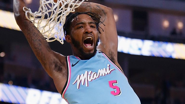 Derrick Jones Jr roars in celebration after throwing down a dunk against Golden State