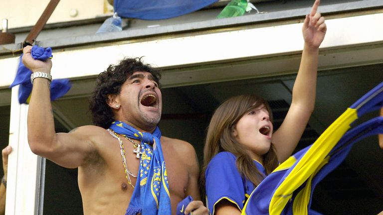 Diego Maradona with daughter Dalma at Boca Juniors' Bombonera in 2006