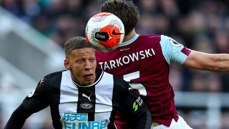 James Tarkowski and Dwight Gayle in action at St James' Park
