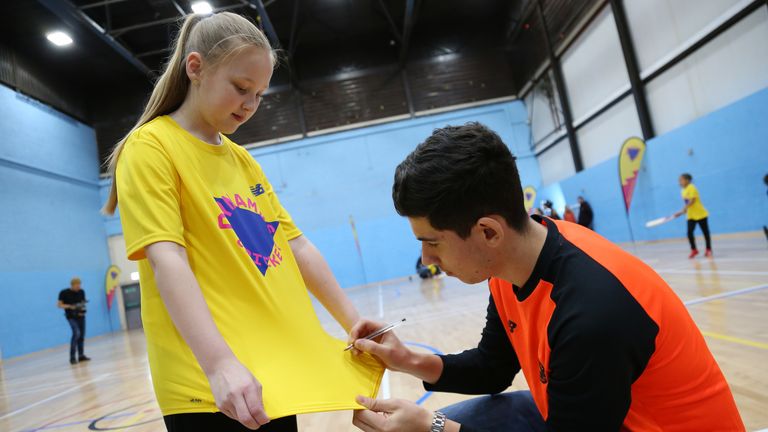 Pat Brown signs a Dynamos Cricket t-shirt for a new fan!
