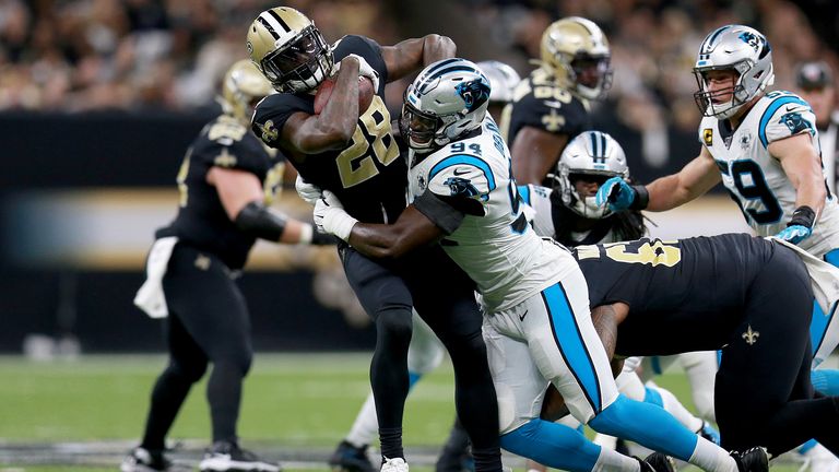 Obada tackles Latavius Murray in the Panthers' clash with the New Orleans Saints 