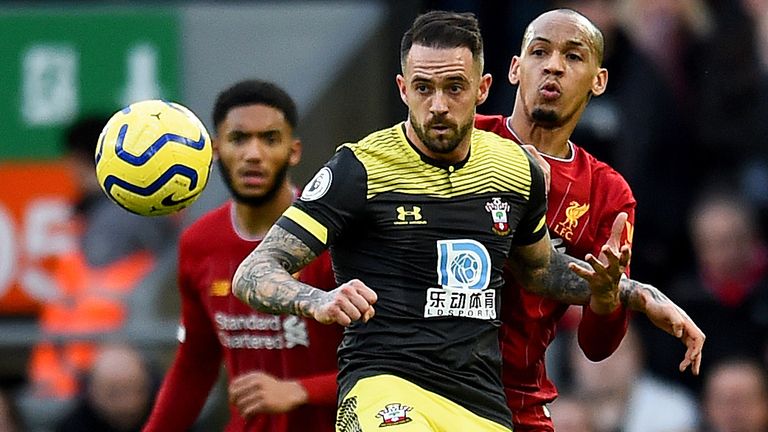 Fabinho and Danny Ings in Premier League action at Anfield