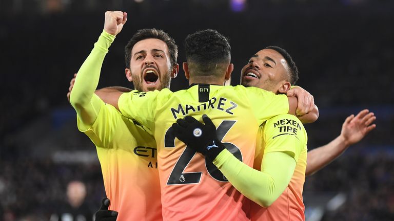Gabriel Jesus celebrates with Riyad Mahrez and Bernardo Silva after scoring against Leicester City