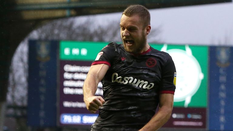 George Puscas of Reading FC celebrates after scoring his team's second goal against Sheffield Wednesday