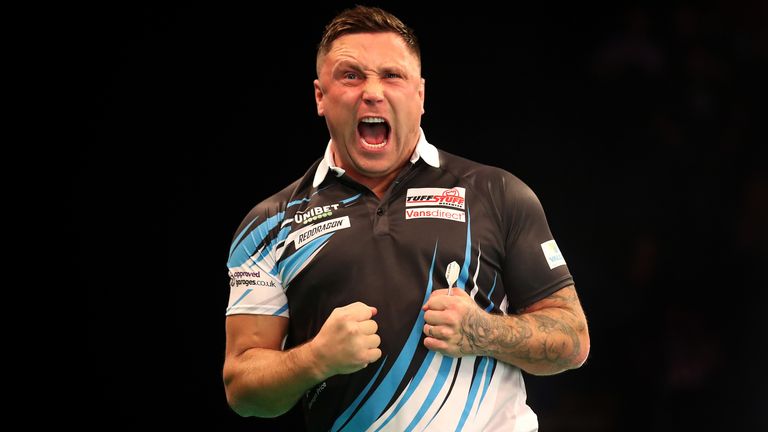 Gerwyn Price celebrates a draw in his match against Michael Smith during day two of the Unibet Premier League at Motorpoint Arena on February 13, 2020 in Nottingham, England