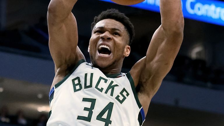 Giannis Antetokounmpo hammers home a dunk in Milwaukee's win over Phoenix