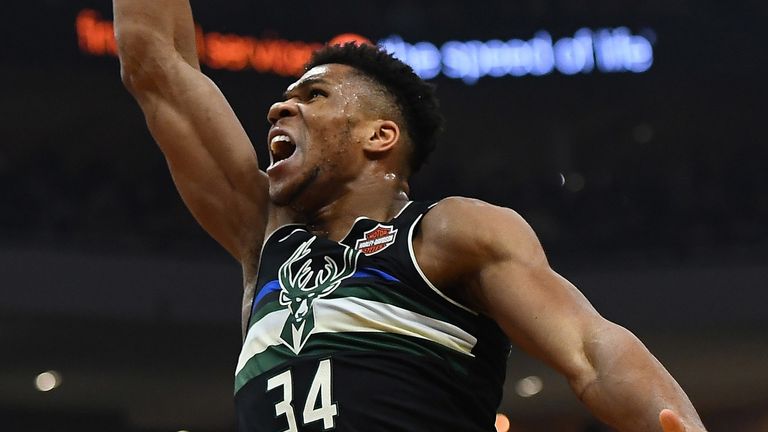 Giannis Antetokounmpo rams home a dunk in the Bucks' win against the 76ers