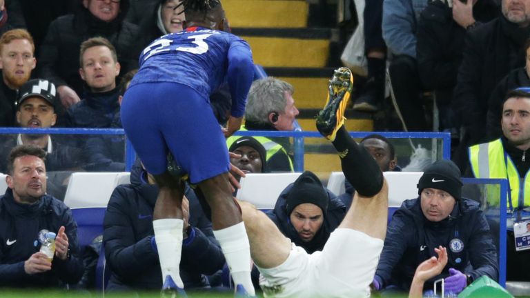 Harry Maguire appears to kick out at Chelsea's Michy Batshuayi