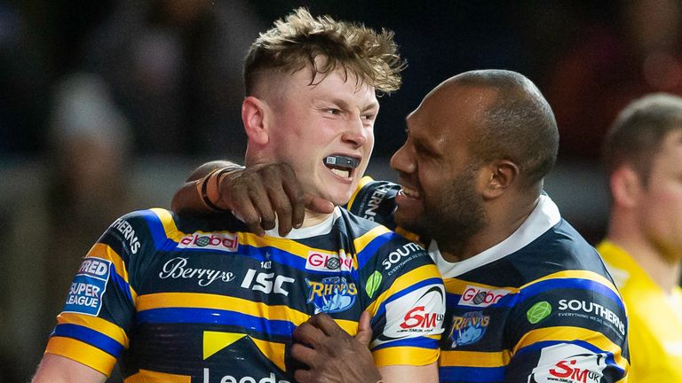 Picture by Allan McKenzie/SWpix.com - 14/02/2020 - Rugby League - Betfred Super League - Leeds Rhinos v Hull KR - Emerald Headingley Stadium, Leeds, England - Leeds&#39;s Harry Newman celebrates his try against Hull KR with Rob Lui.