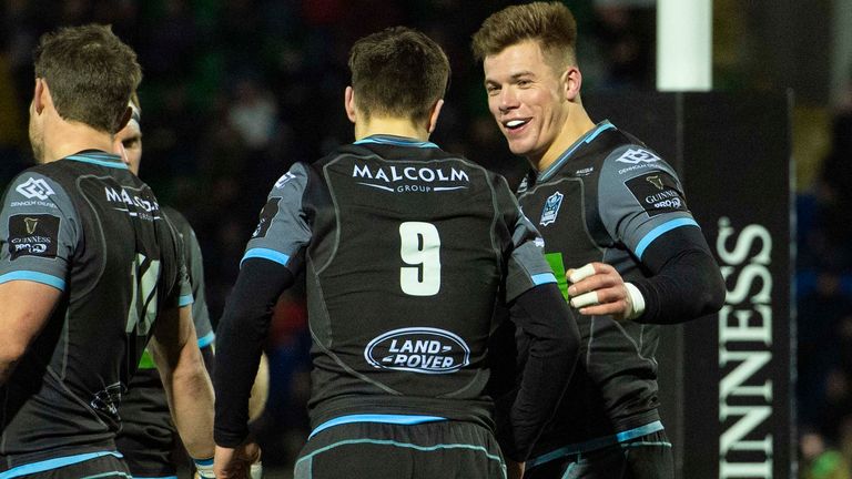 Glasgow Warriors’ Hu Jones (right) celebrates his try with team mate Jamie Dobie during the Guinness Pro14 match between Glasgow Warriors and Scarlets at Scotstoun Stadium on February 22, 2020, in Glasgow, Scotland.