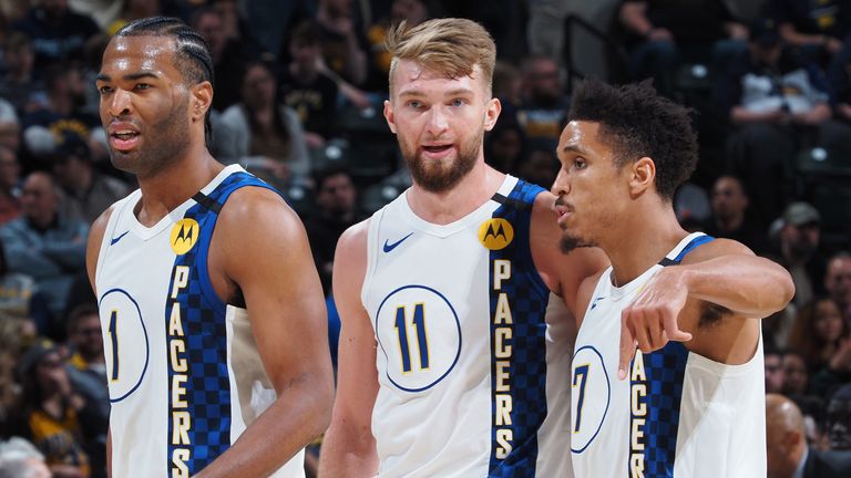 Domantas Sabonis shares a word with his Pacers team-mates