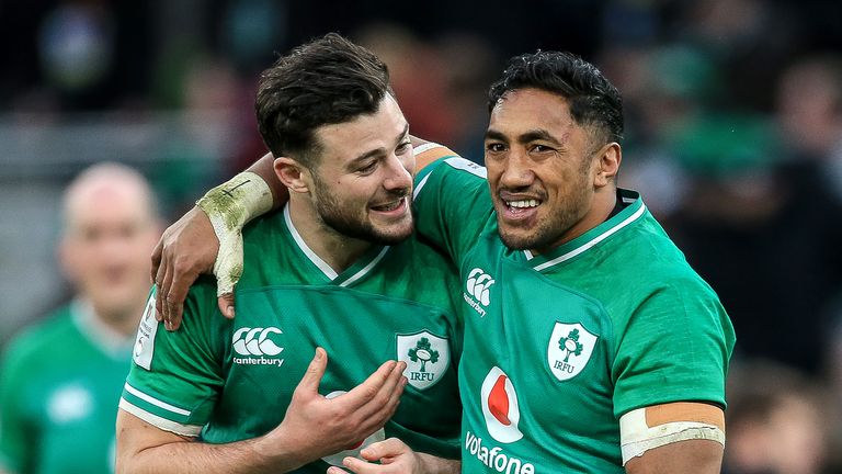 Ireland's Robbie Henshaw and Bundee Aki celebrate after the game