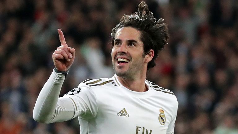 Real Madrid's Isco celebrates scoring against Manchester City