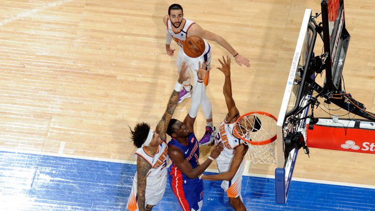 Reggie Jackson of the Detroit Pistons drives to the basket against the Phoenix Suns
