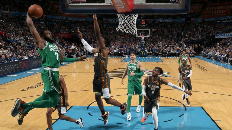 Jaylen Brown of the Boston Celtics dunks the ball against the Oklahoma City Thunder