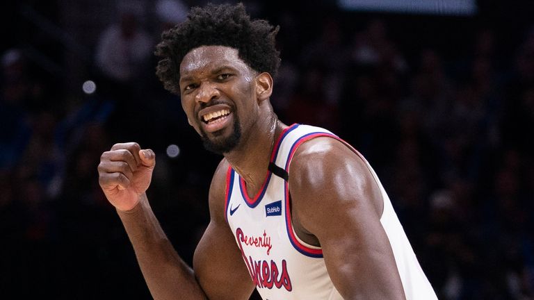 Joel Embiid fires up the crowd during Philadelphia's overtime win against Brooklyn