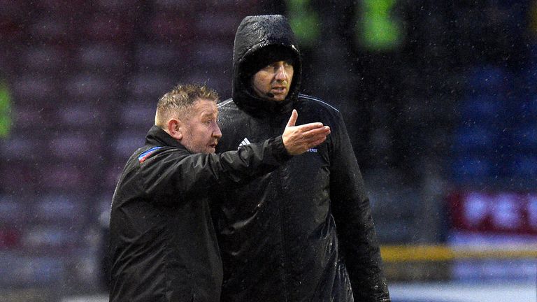Inverness manager John Robertson exchanges words with the officials after James Keatings is sent off 