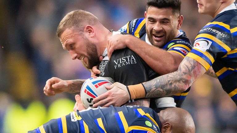 Picture by Allan McKenzie/SWpix.com - 02/02/2020 - Rugby League - Betfred Super League - Leeds Rhinos v Hull FC - Emerald Headingley Stadium, Leeds, England - Hull FC's Josh Griffin is tackled by Leeds's Rhys Martin & Rob Lui.