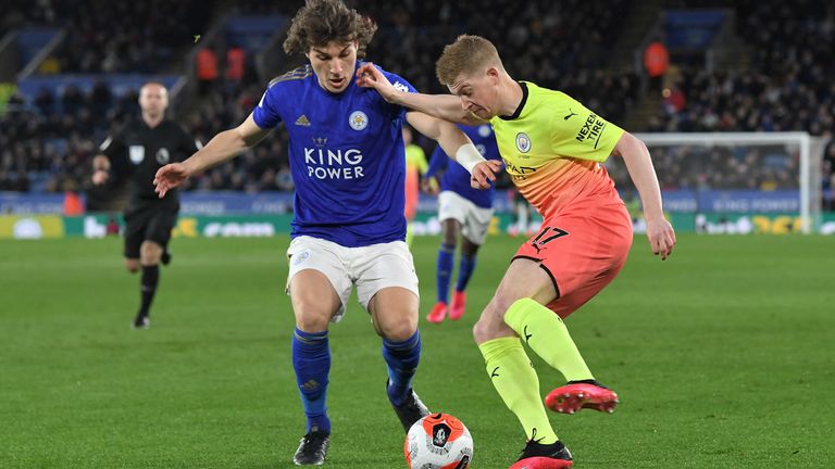 Kevin De Bruyne takes on Leicester's Caglar Soyuncu at the King Power Stadium