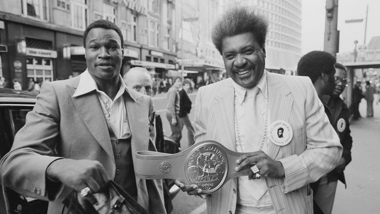 Larry Holmes with promoter Don King