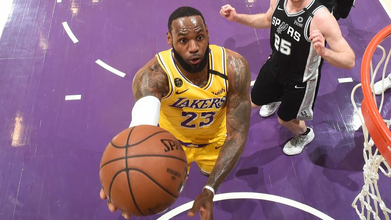 LeBron James attacks the baskets against the Spurs