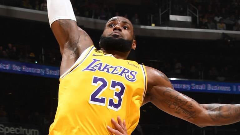 LeBron James rocks the rim with a huge dunk against the New Orleans Pelicans
