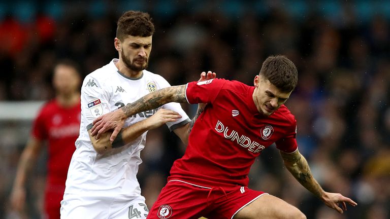 Leeds United's Mateusz Klich (left) and Bristol City's Jamie Paterson (right) battle for the ball during the Sky Bet Championship match at Elland Road, Leeds. PA Photo. Picture date: Saturday February 15, 2020. See PA story SOCCER Leeds. Photo credit should read: Tim Goode/PA Wire. RESTRICTIONS: EDITORIAL USE ONLY No use with unauthorised audio, video, data, fixture lists, club/league logos or "live" services. Online in-match use limited to 120 images, no video emulation. No use in betting, games or single club/league/player publications.