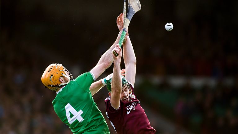 Richie English of Limerick and Brian Concannon of Galway compete for possession