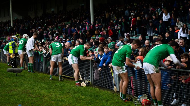 The Limerick hurlers sign autographs after their eight-point win over Galway