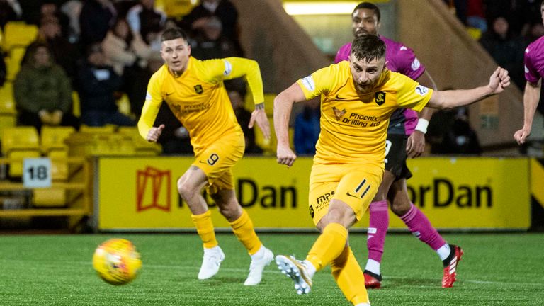 Livingston’s Steven Lawless scores the opening goal against St Mirren
