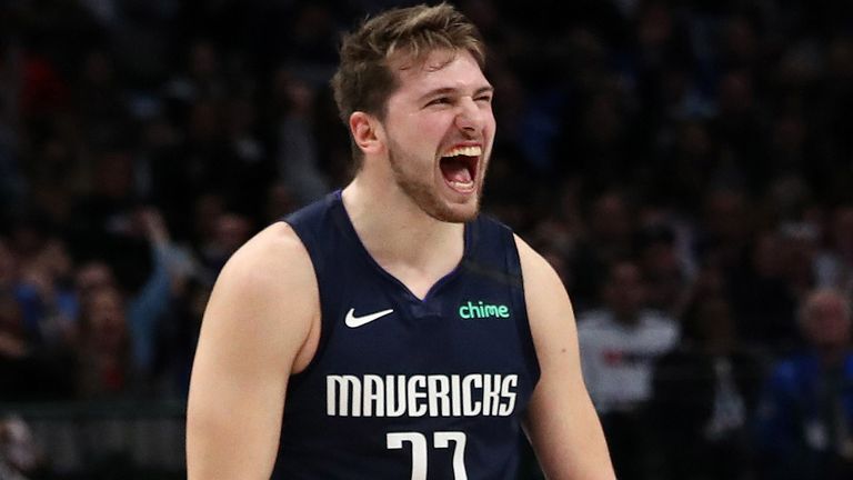 Luka Doncic roars in celebration during the Mavericks' win over the Kings