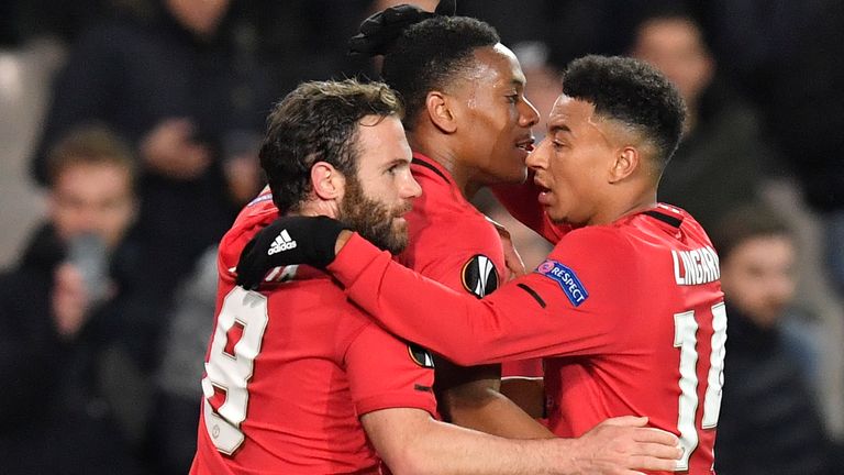 Martial, Lingard and Mata celebrate a goal against Club Brugge