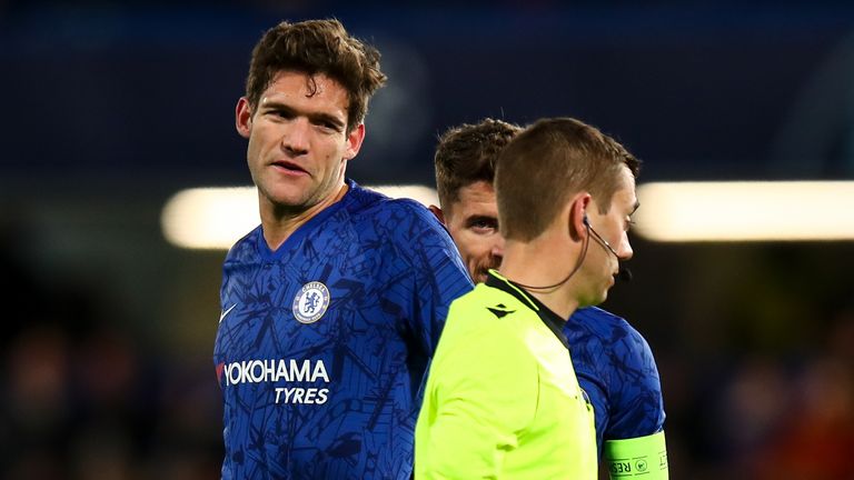 Referee Clement Turpin sends off Marcos Alonso of Chelsea