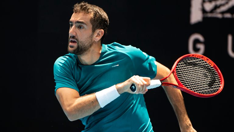 Marin Cilic of Croatia plays a backhand in his fourth round match against Milos Raonic of Canada on day seven of the 2020 Australian Open at Melbourne Park on January 26, 2020 in Melbourne, Australia