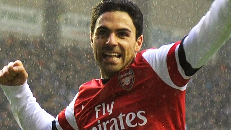 Mikel Arteta celebrates scoring the Arsenal goal during the Barclays Premier League match between Wigan Athletic and Arsenal at DW Stadium on December 22, 2012