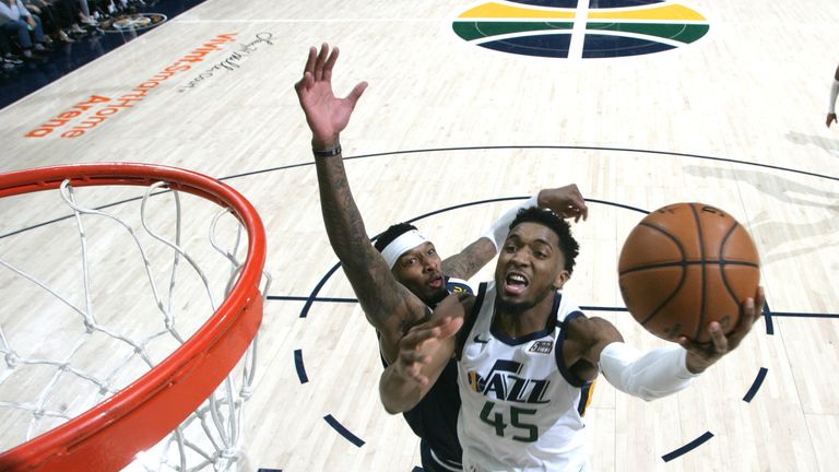 Donovan Mitchell of the Utah Jazz shoots the ball against the Denver Nuggets