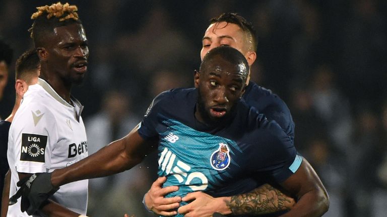 Moussa Marega was restrained by team-mates as he attempted to confront opposition fans