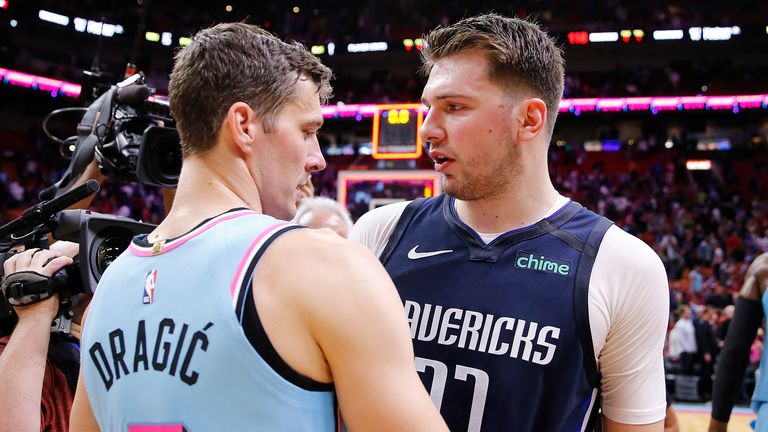 Former Slovenian national team mates Goran Dragic of the Miami Heat (L) and  Luka Doncic of the Dallas Mavericks embraced after the game Friday, which was deemed Slovenian Heritage Night. 