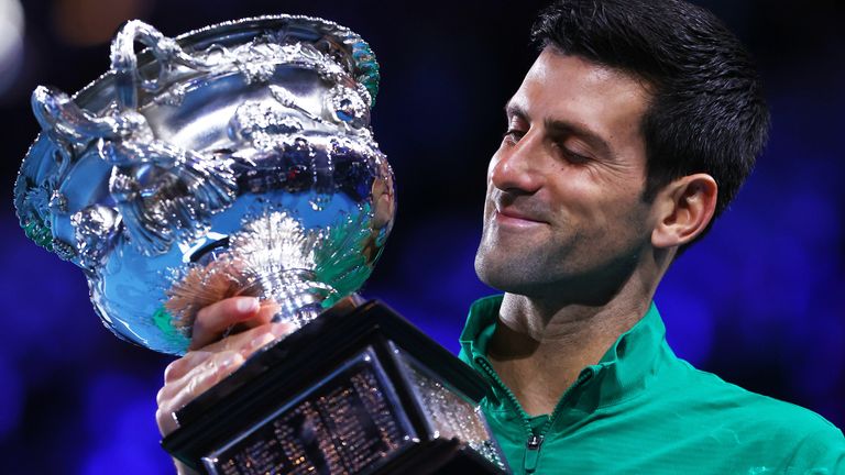Novak Djokovic of Serbia poses with the Norman Brookes Challenge Cup after winning the Men's Singles Final against Dominic Thiem of Austria on day fourteen of the 2020 Australian Open at Melbourne Park on February 02, 2020 in Melbourne, Australia.