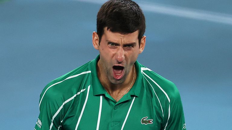 Novak Djokovic of Serbia celebrates winning championship point after his Men's Singles Final against Dominic Thiem of Austria on day fourteen of the 2020 Australian Open at Melbourne Park on February 02, 2020 in Melbourne, Australia.