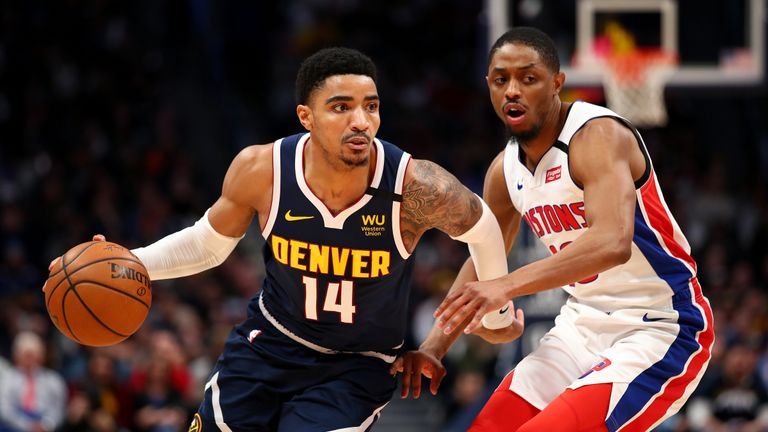 Gary Harris #14 of the Denver Nuggets drives past Brandon Knight #20 of the Detroit Pistons at Pepsi Center on February 25, 2020 in Denver, Colorado.