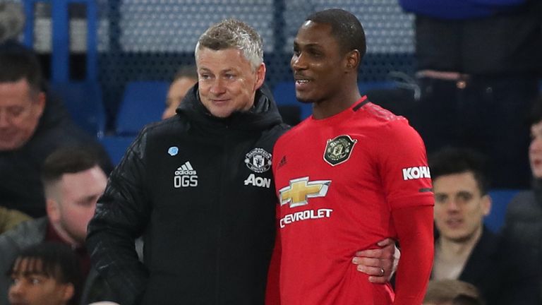 Odion Ighalo with Ole Gunnar Solskjaer before coming on as substitute at Stamford Bridge