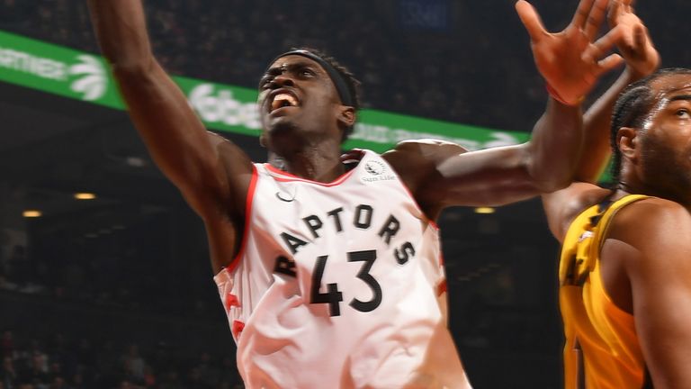 Pascal Siakam rises to score at the rim against the Pacers