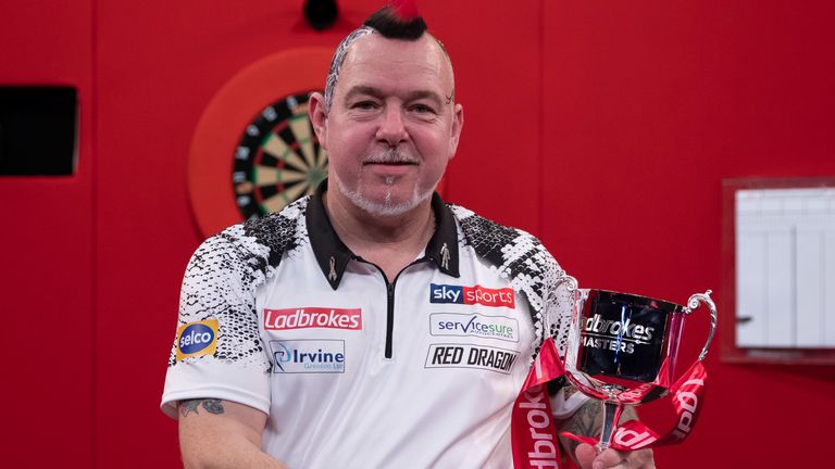 Peter Wright followed up his World Championship victory by claiming the title at the season-opening Masters