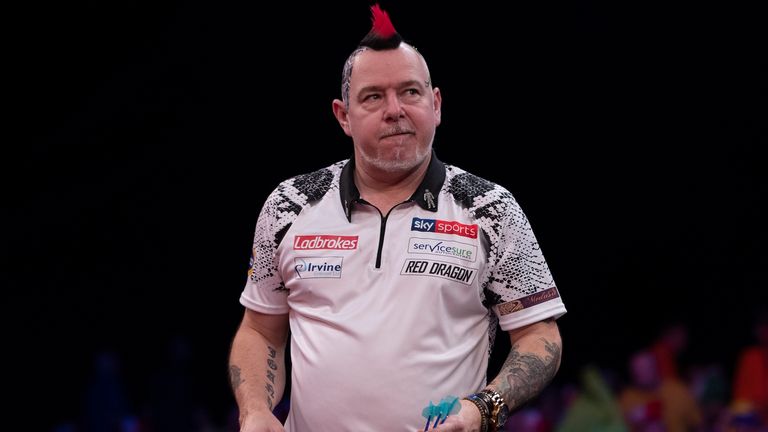 LADBROKES MASTERS 2020.ARENA MK,.MILTON KEYNES.PIC;LAWRENCE LUSTIG.FINAL.PETER WRIGHT v MICHAEL SMITH.PETER WRIGHT  IN ACTION