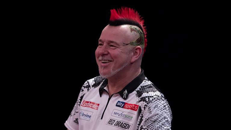 LADBROKES MASTERS 2020.ARENA MK,.MILTON KEYNES.PIC;LAWRENCE LUSTIG.FINAL.PETER WRIGHT v MICHAEL SMITH.PETER WRIGHT  IN ACTION