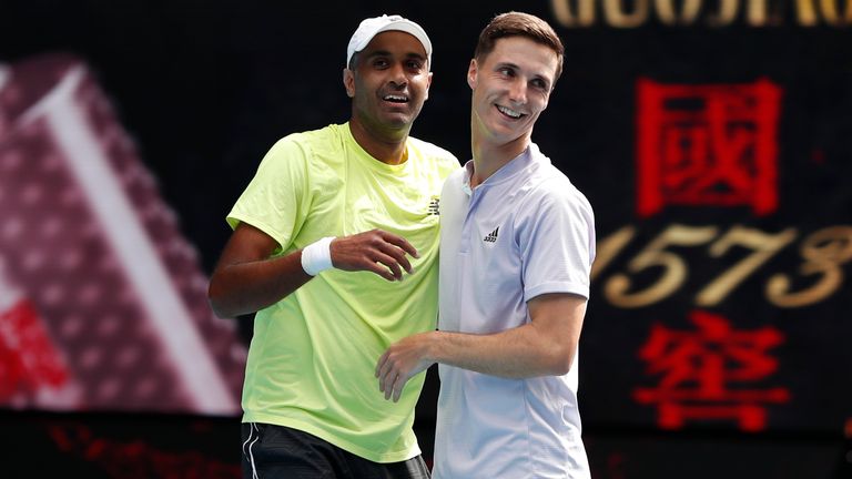 Rajeev Ram of the United States and Joe Salisbury of Great Britain celebrate winning championship point in their Men's Doubles Finals match against Max Purcell of Australia and Luke Saville of Australia on day fourteen of the 2020 Australian Open at Melbourne Park on February 02, 2020 in Melbourne, Australia