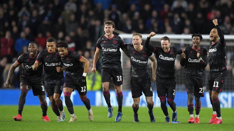 The Readings players celebrate their penalty shootout win over Cardiff on Tuesday